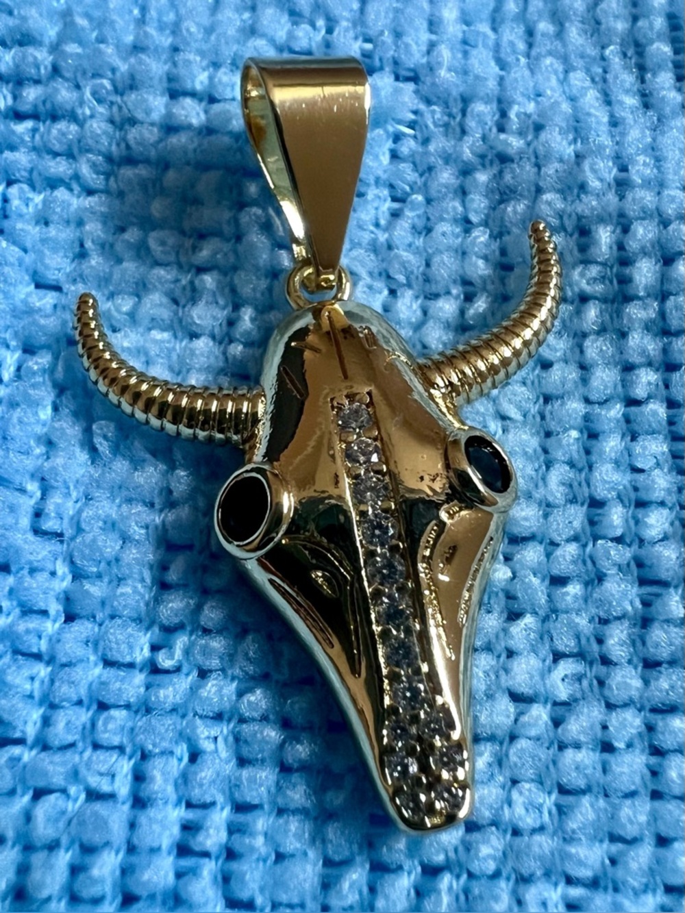 Gold-Plated Bull Skull with Black Crystal with Clear Crystal Stones.